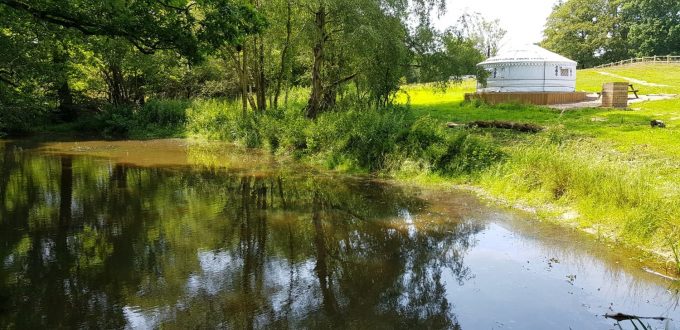sussexescapes yurt next to stream