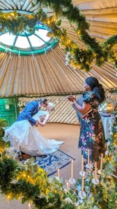 intimate yurt wedding reception venue - Welcome to Yurt Specialists Intimate outdoor yurt wedding reception venue with a couple embracing near the beautifully lit entrance.